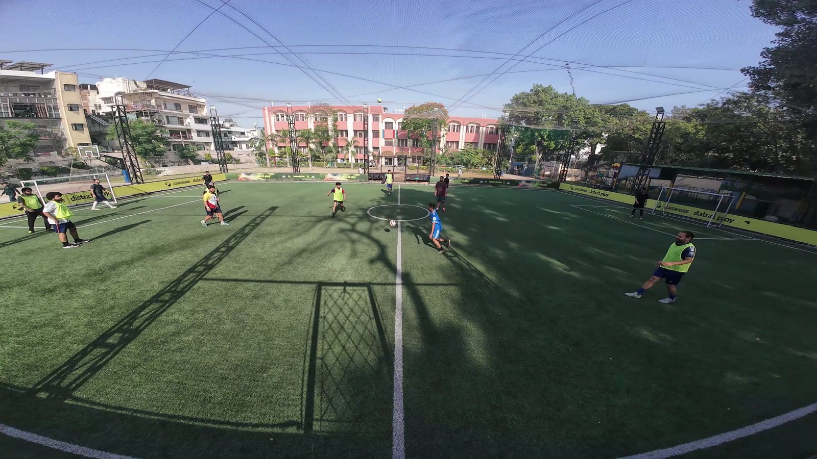 Players competing for the ball at a turf